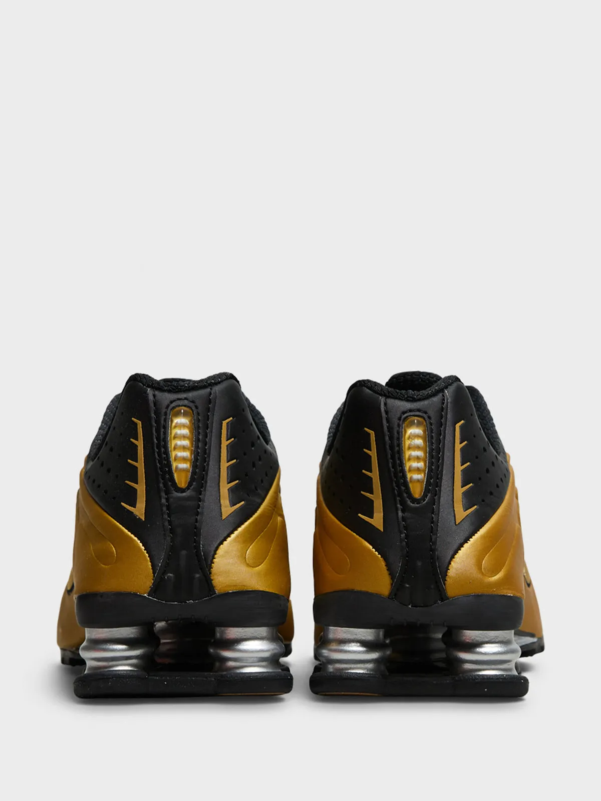 Shox R4 Sneakers in Black and Metallic Gold