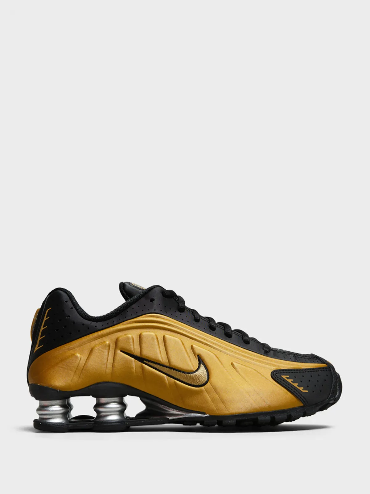 Shox R4 Sneakers in Black and Metallic Gold